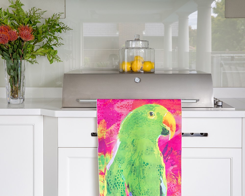 Eclectus parrot tea towel in a kitchen